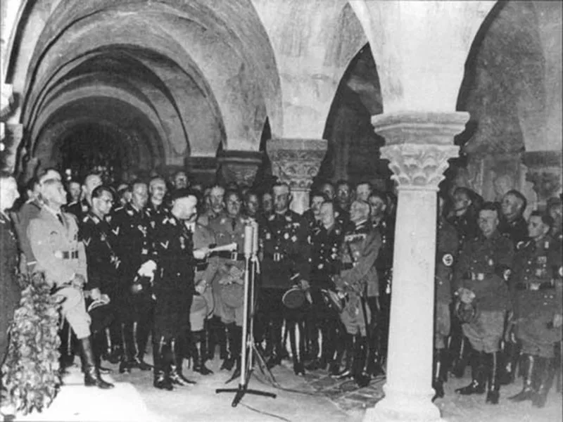 SS Chief Himmler making a speech in a cathedral. This and other contrived "religious spectacles" were part of the effort by the Nazis, actual enemies of religio